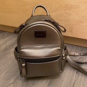99% new Mini Silver backpack